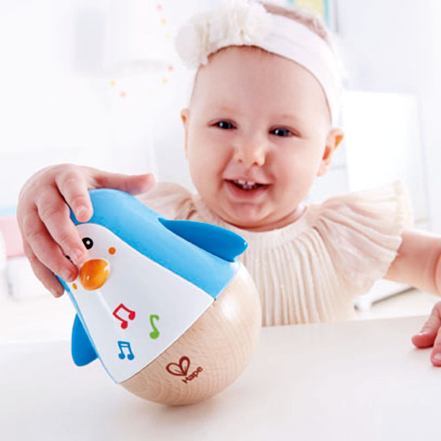 image-Music Penguin Tumbler Toy