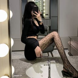 image-Women's Sexy Black Silk Fishnet Pantyhose With Thin Legs