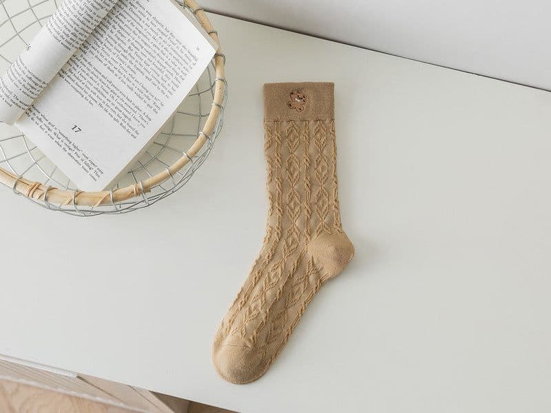 image-Stockings In Women's Stockings Embroidered With Reverse Yarn