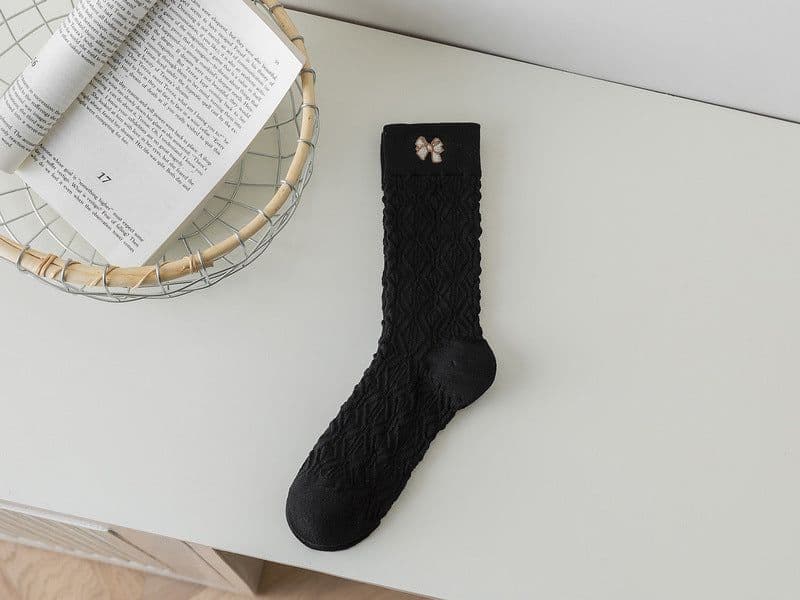 image-Stockings In Women's Stockings Embroidered With Reverse Yarn