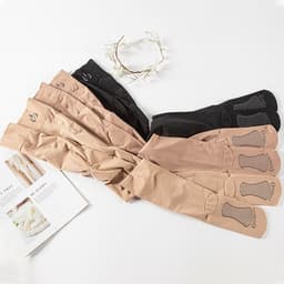 image-Thin Skin-colored Bare Leggings With Feet
