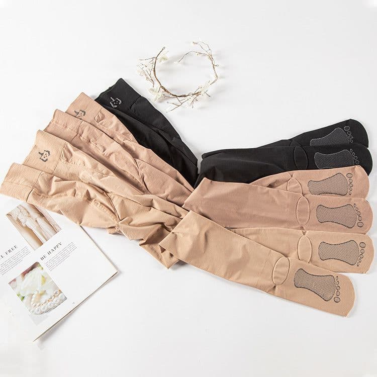 image-Thin Skin-colored Bare Leggings With Feet