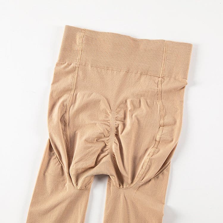 image-Thin Skin-colored Bare Leggings With Feet