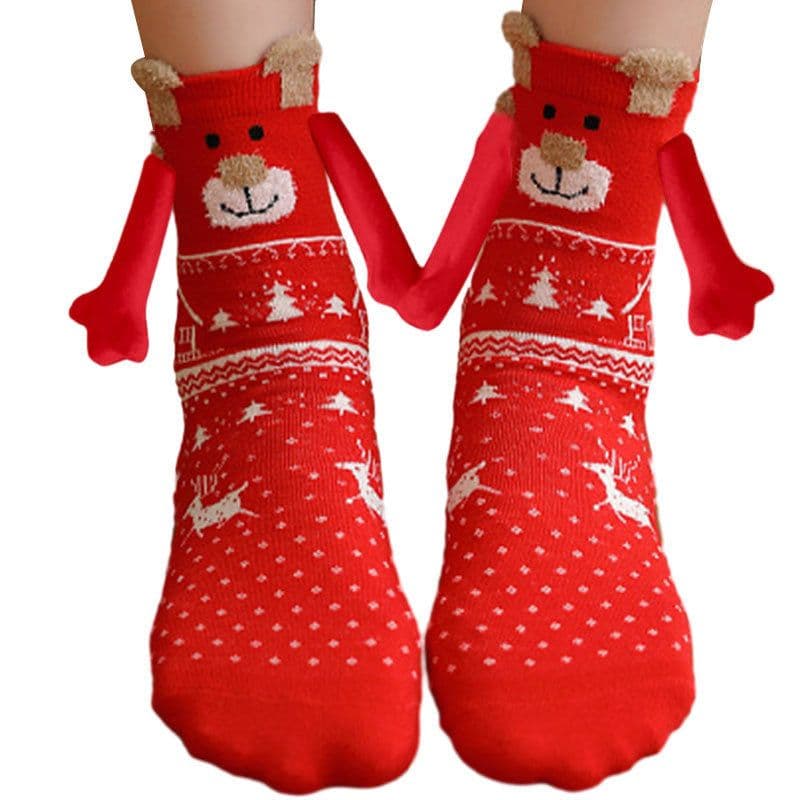 image-Hand Holding Couple Magnetic Handle Christmas Stockings