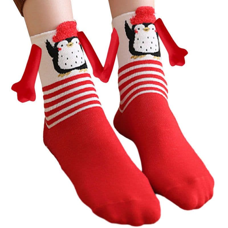 image-Hand Holding Couple Magnetic Handle Christmas Stockings