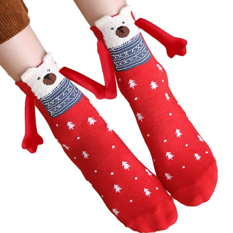 image-Hand Holding Couple Magnetic Handle Christmas Stockings