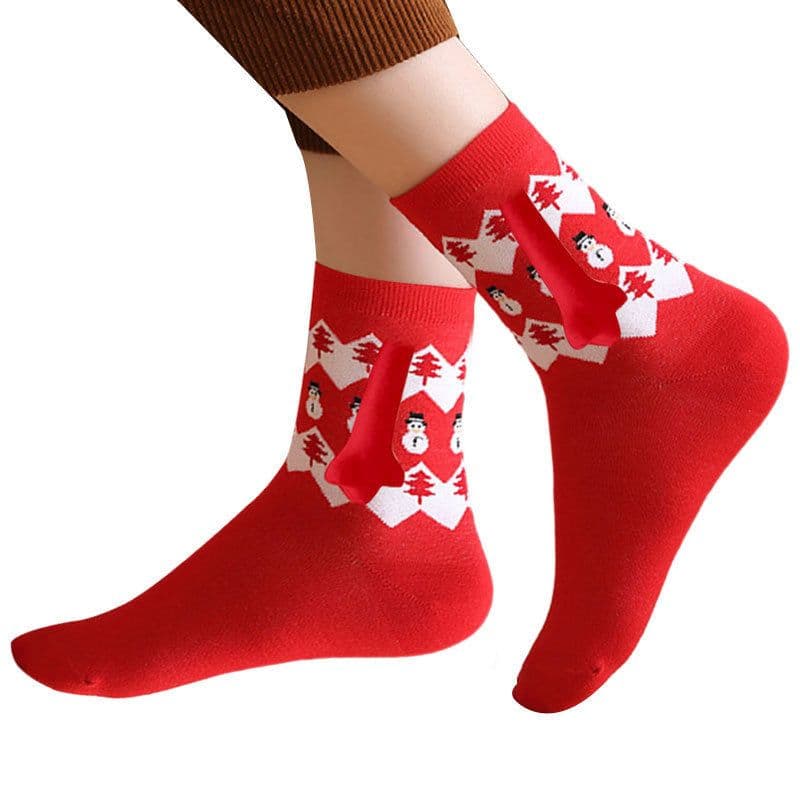 image-Hand Holding Couple Magnetic Handle Christmas Stockings
