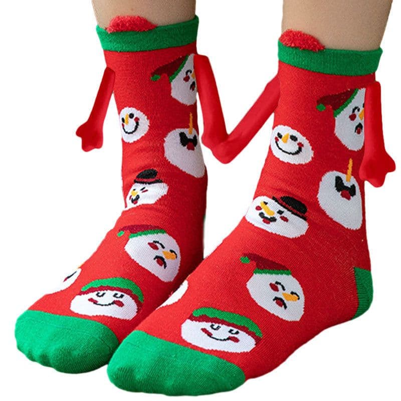 image-Hand Holding Couple Magnetic Handle Christmas Stockings