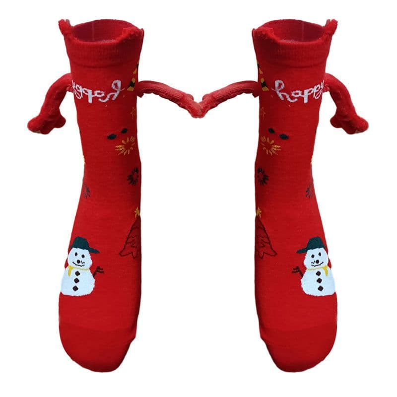 image-Hand Holding Couple Magnetic Handle Christmas Stockings