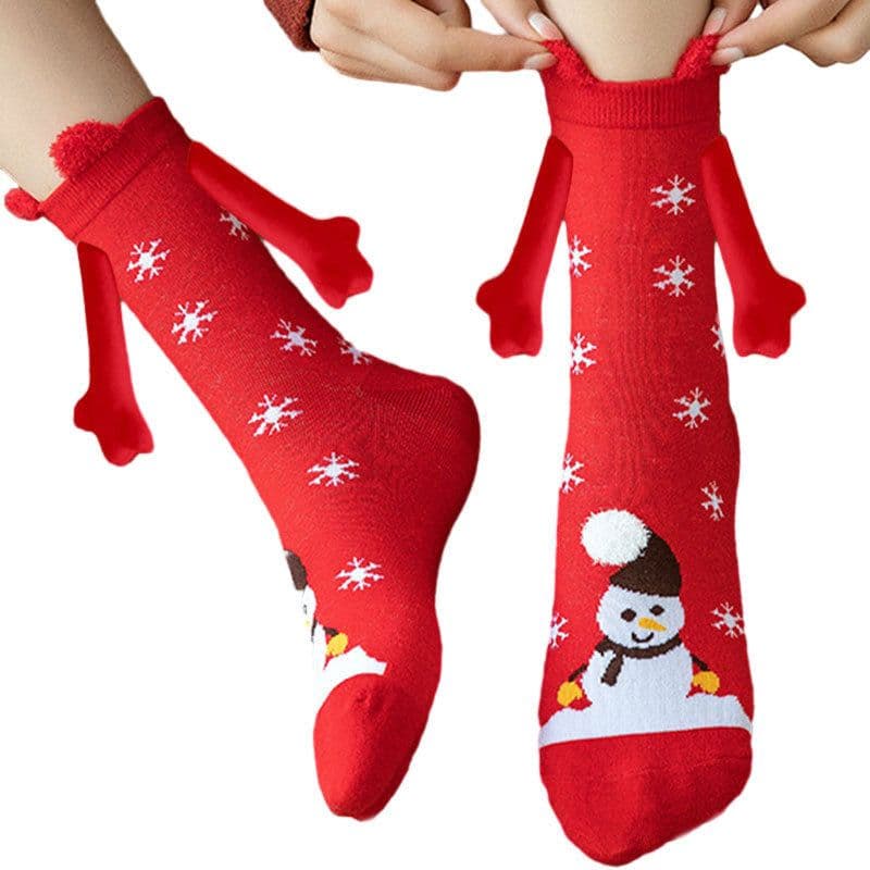 image-Hand Holding Couple Magnetic Handle Christmas Stockings