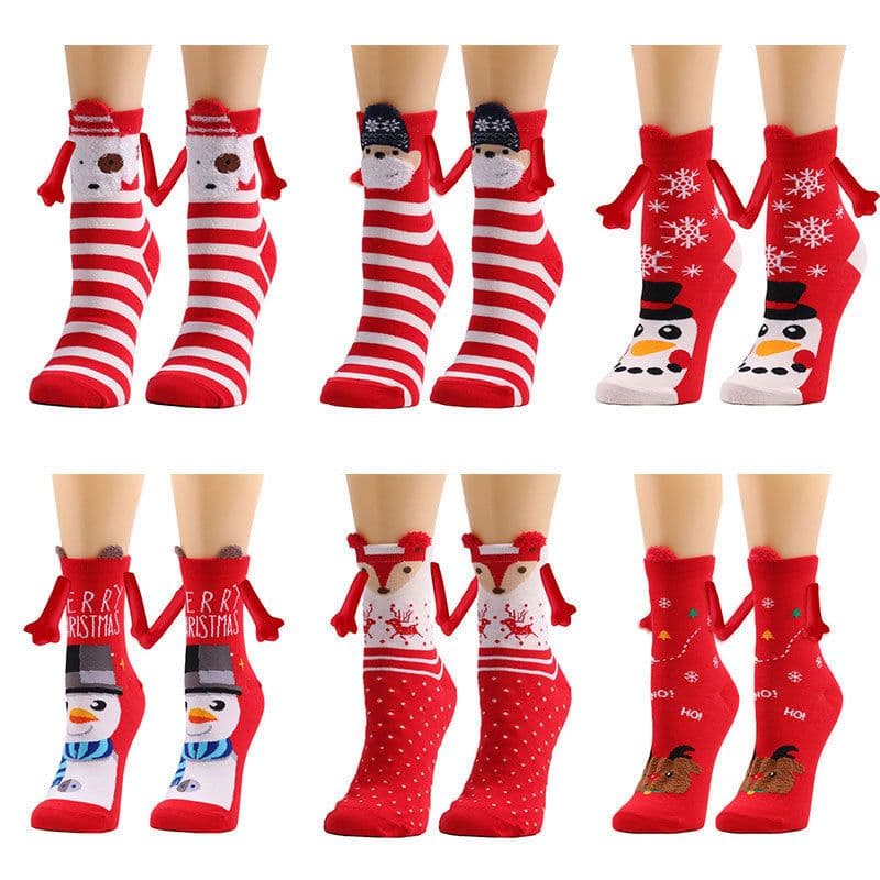 image-Hand Holding Couple Magnetic Handle Christmas Stockings