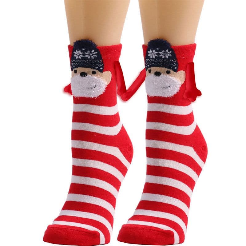 image-Hand Holding Couple Magnetic Handle Christmas Stockings