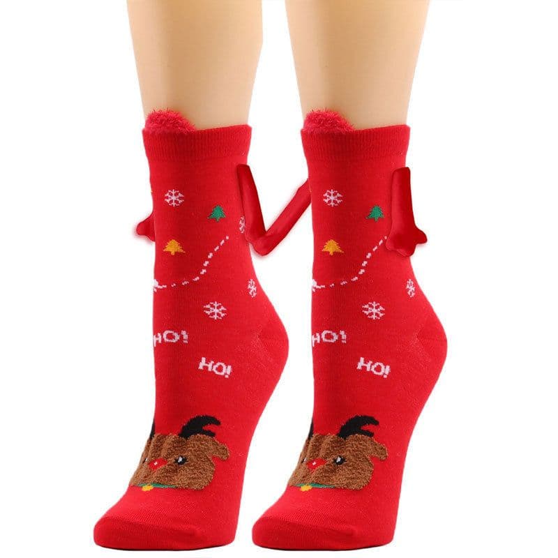 image-Hand Holding Couple Magnetic Handle Christmas Stockings