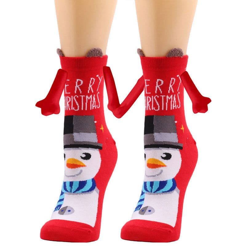 image-Hand Holding Couple Magnetic Handle Christmas Stockings