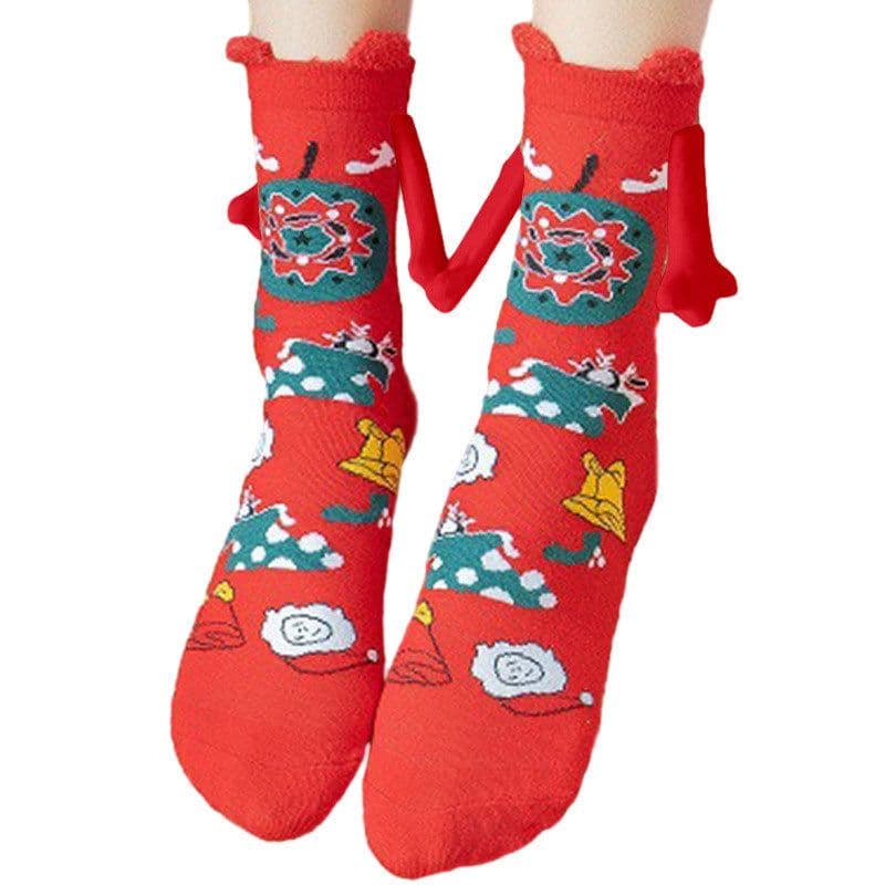 image-Hand Holding Couple Magnetic Handle Christmas Stockings