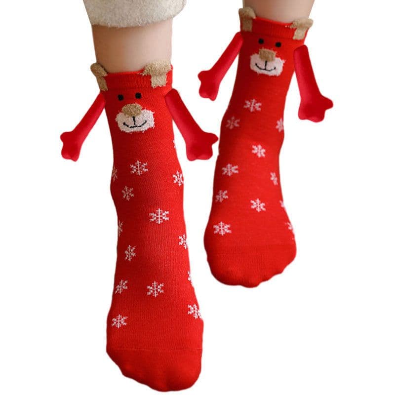 image-Hand Holding Couple Magnetic Handle Christmas Stockings