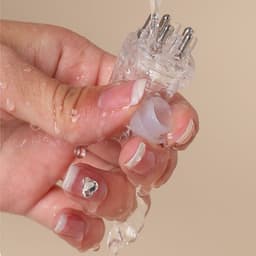 image-Mini Portable Scalp Ball Hair Conditioner Medicine Supplying Comb
