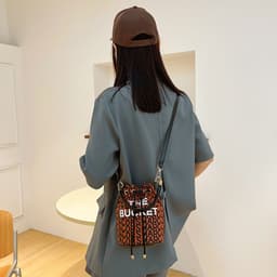 image-Fashion Alphabet Bucket Bag Retro Portable Messenger Bag