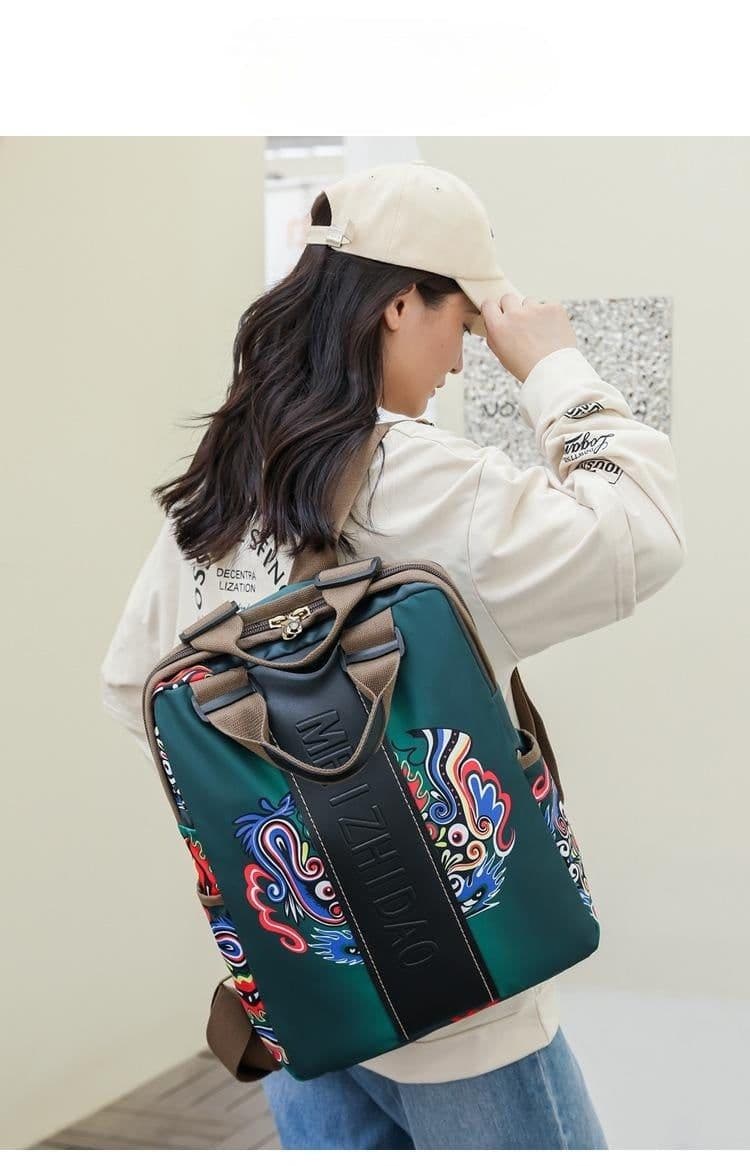 image-Retro Printed Wear-resistant Splash Proof Large Capacity Stitching Backpack For Women