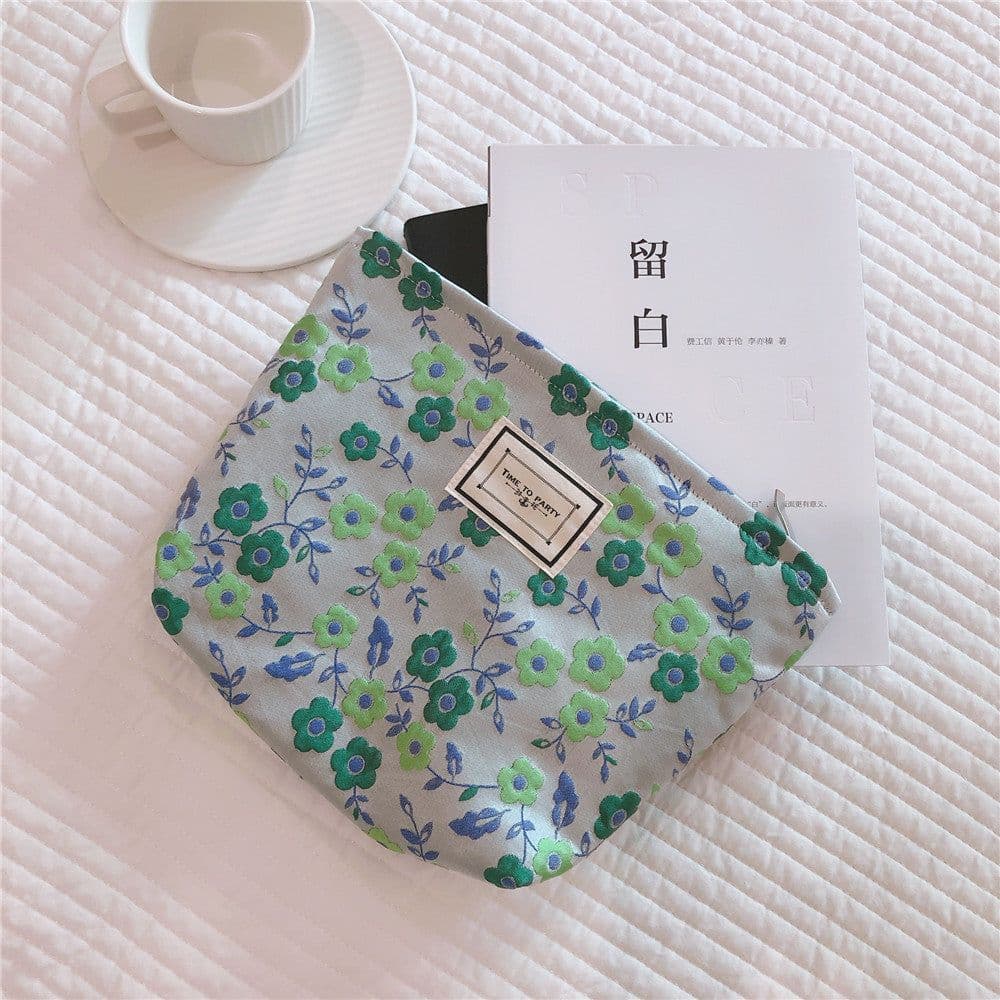 image-Elegant Literary Flower Clutch