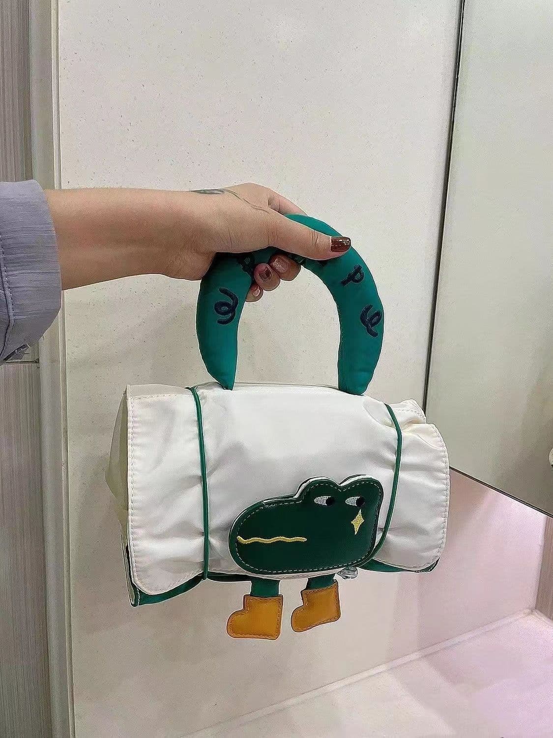 image-New Upgraded Cute Cartoon Large Capacity Makeup Personal Hygiene Bag Mesh Handbag