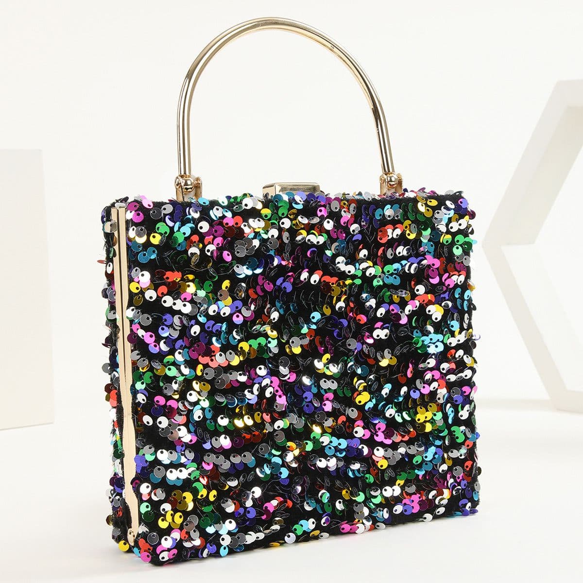 image-Women's Hand Holding Dinner Bag Colorful Sequins