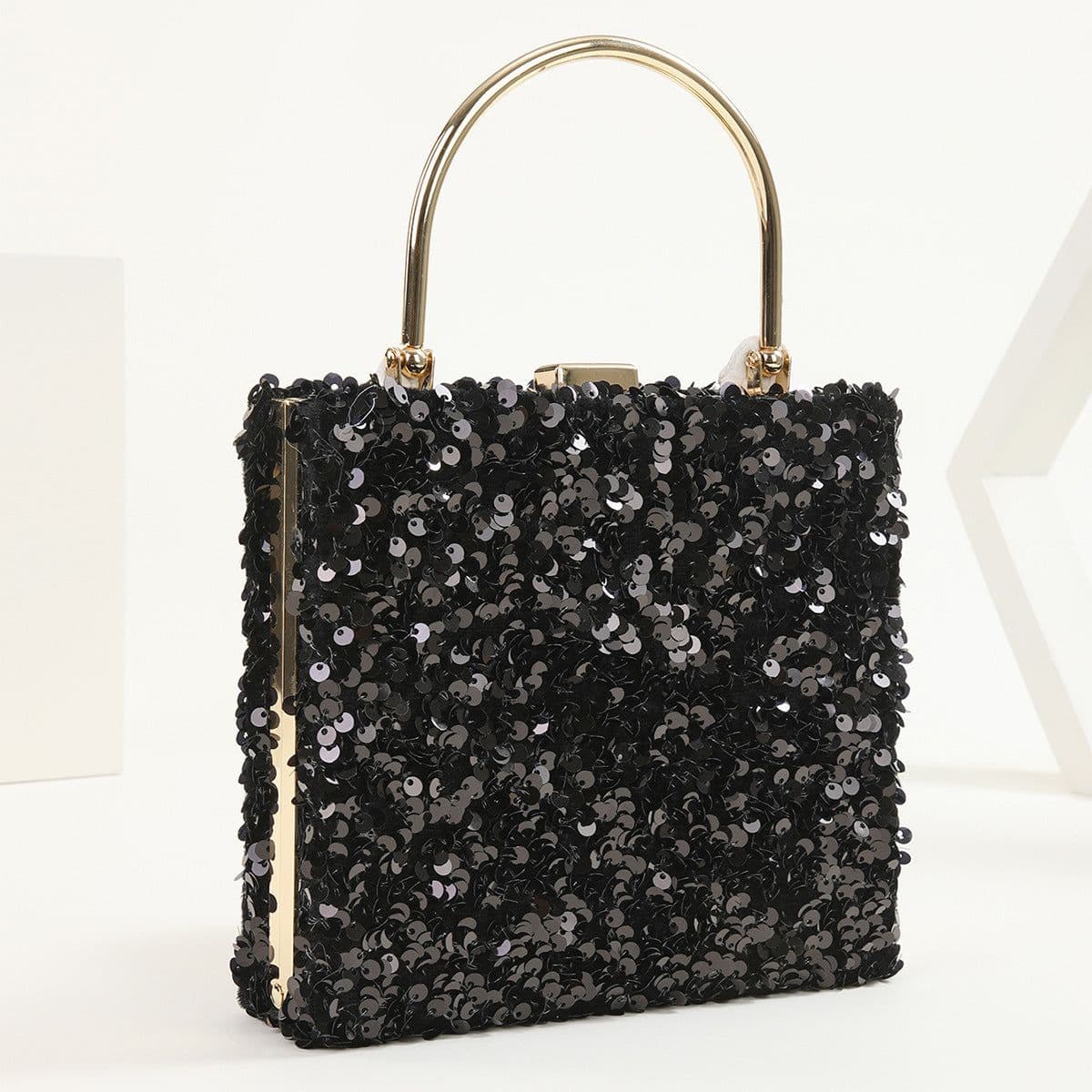 image-Women's Hand Holding Dinner Bag Colorful Sequins