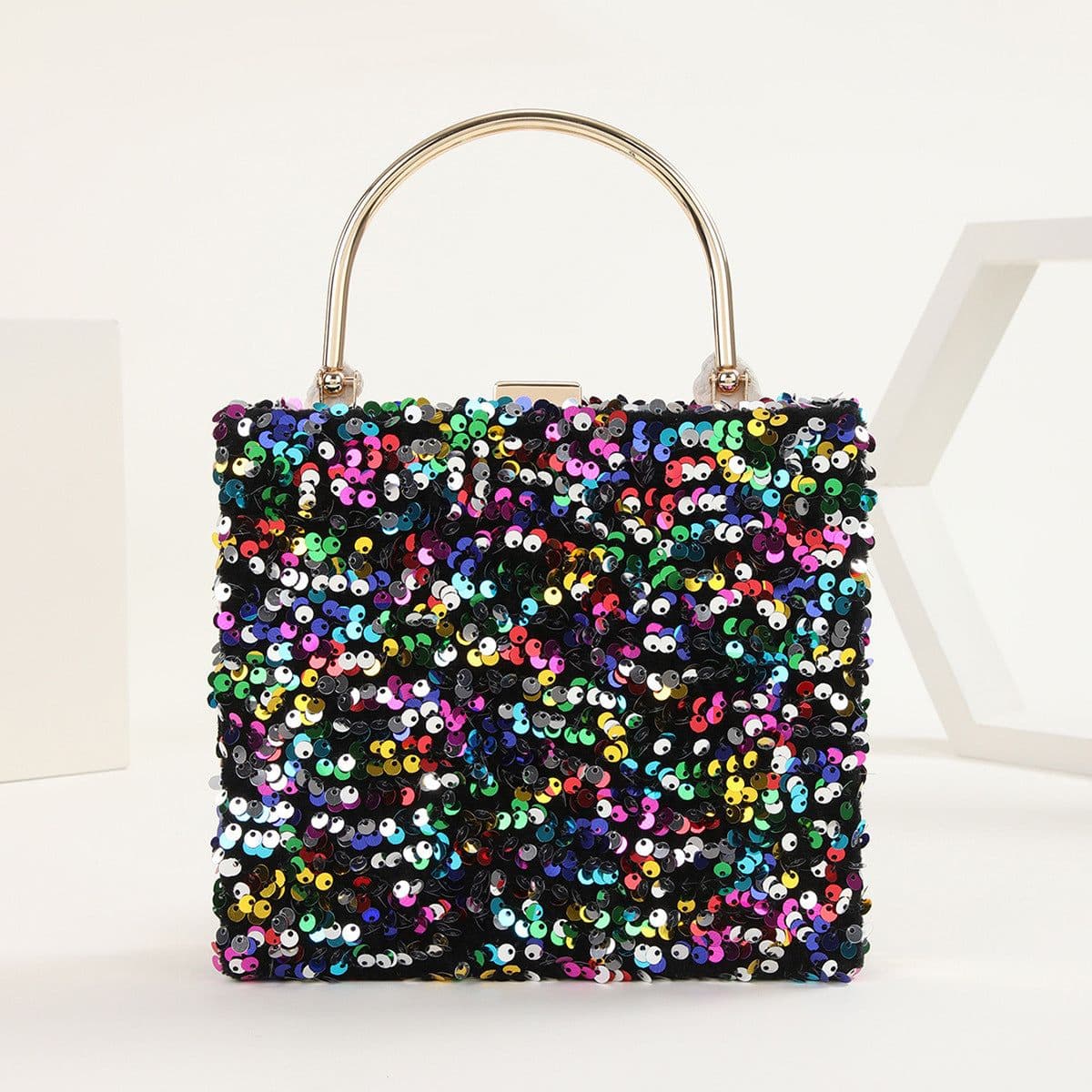 image-Women's Hand Holding Dinner Bag Colorful Sequins