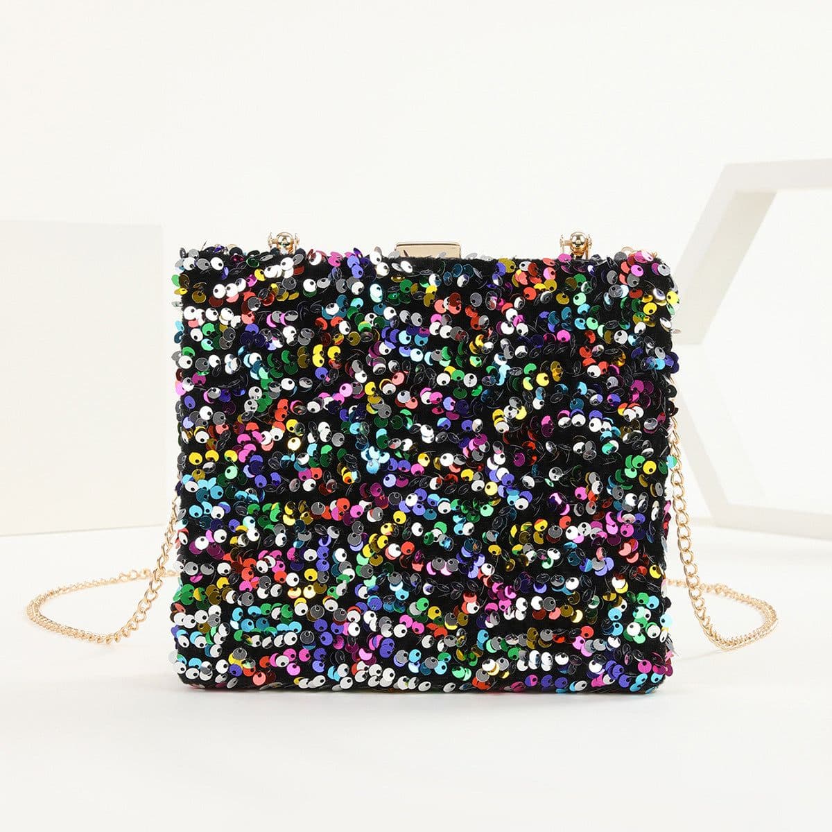 image-Women's Hand Holding Dinner Bag Colorful Sequins