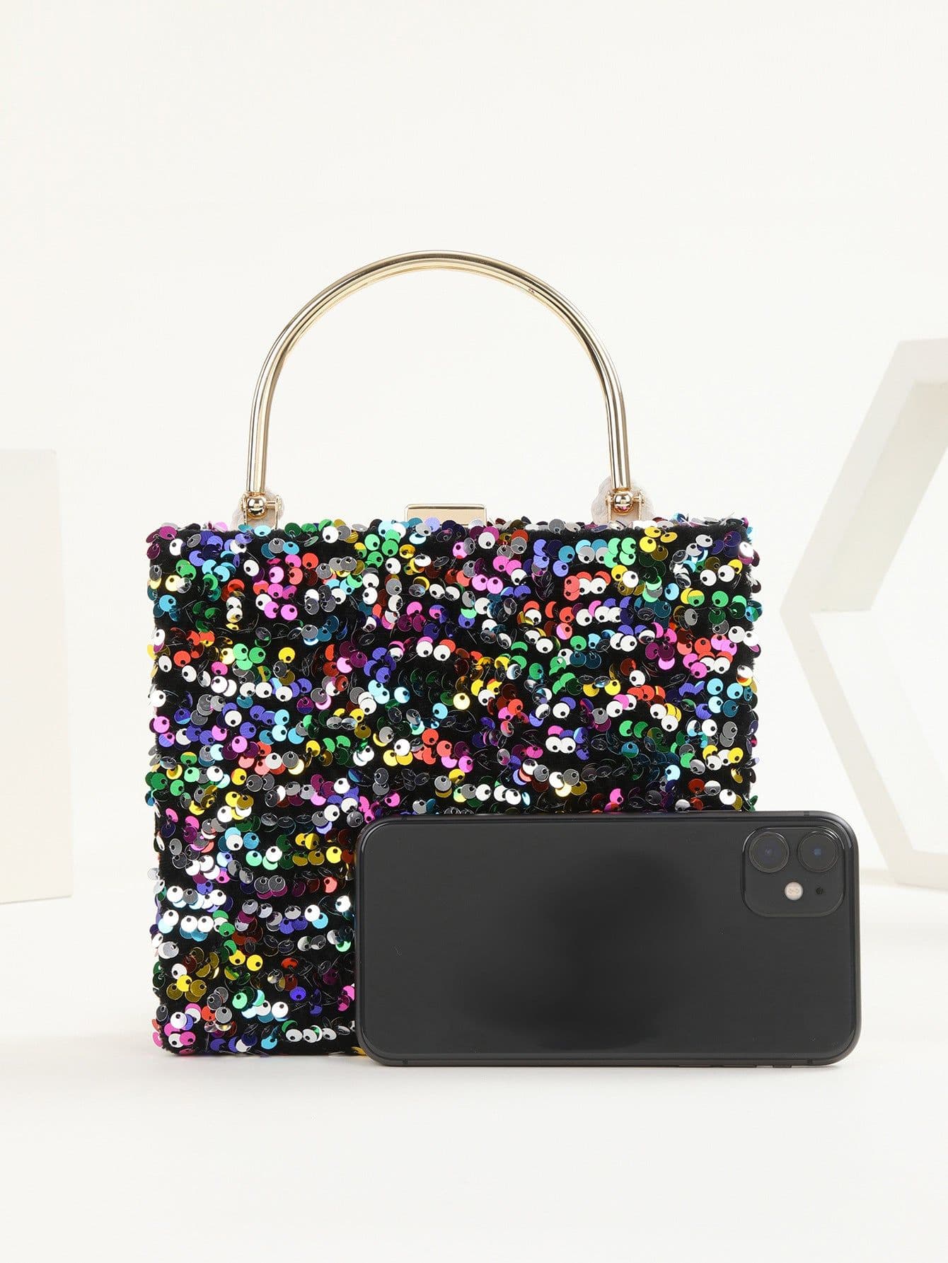 image-Women's Hand Holding Dinner Bag Colorful Sequins
