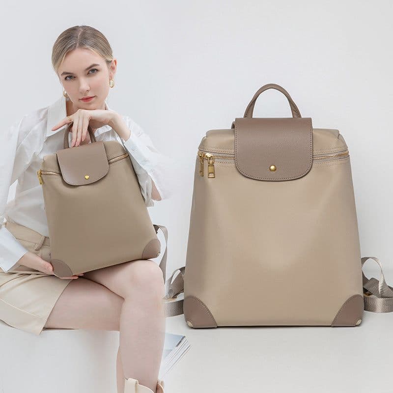 image-Backpack Casual Shoulder Hand-carrying Nylon Canvas Traveling Bag