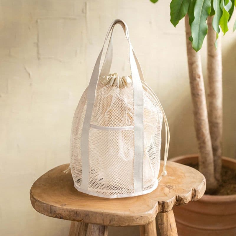 image-Travel Storage Bag Mesh Hollow Out Handbag Drawstring Wash Bag