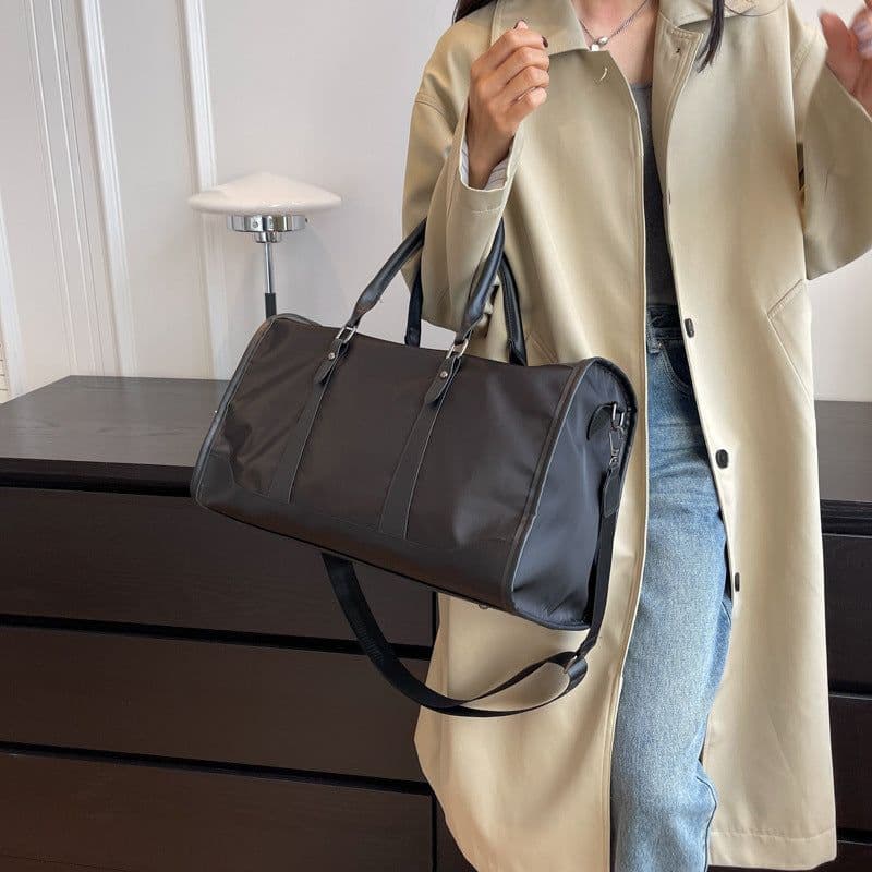 image-Large Capacity Waterproof And Foldable Female Hand-held Luggage Bag