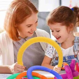 image-Colorful Plastic Tube Coil Children's Creative Magical Toy Circle Funny Toys Early Development Educational Folding Toy