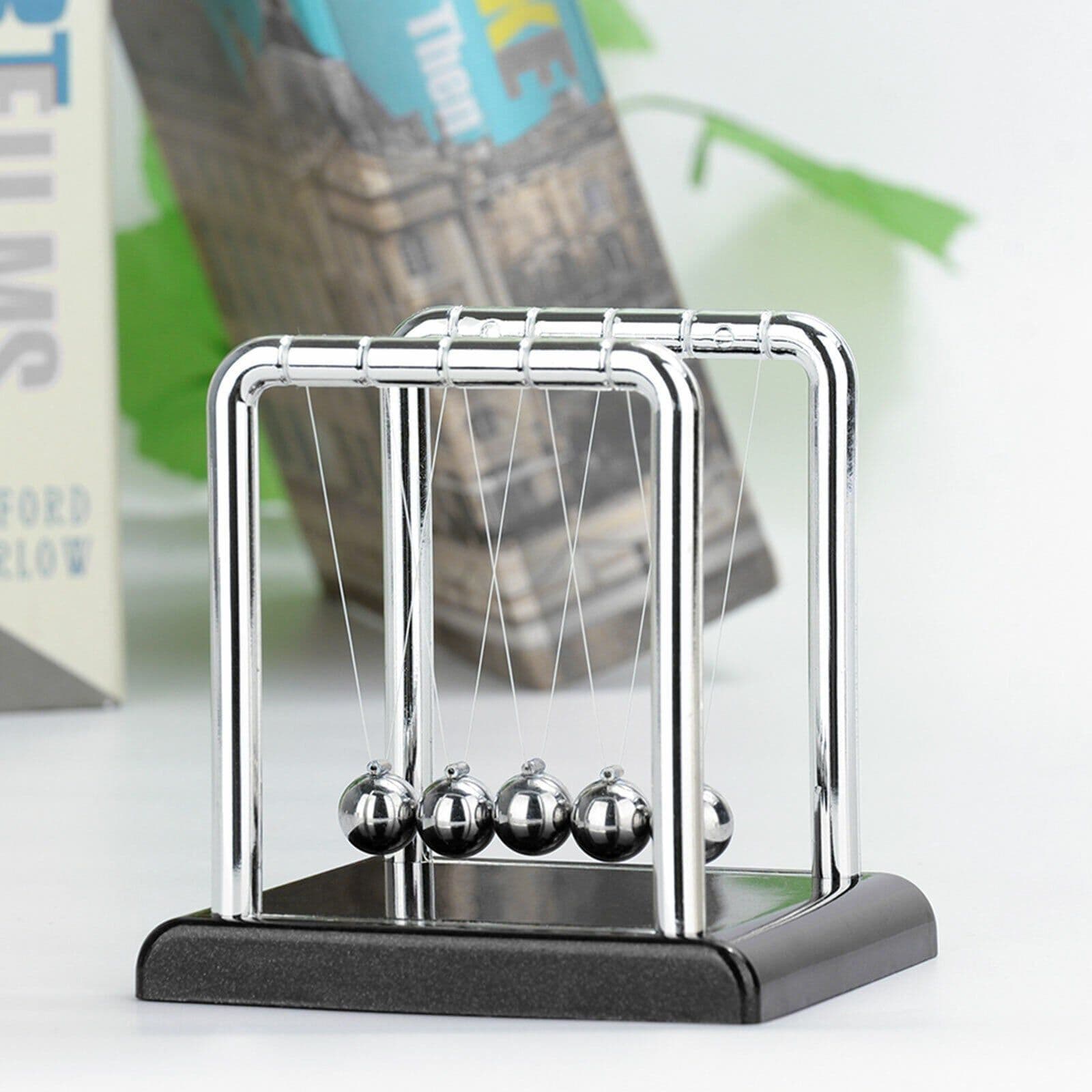 image-Newtons Cradle Steel Balance Ball Physics Science Pendulum Early Development Educational Desktop Toy Gift Office DecorationNewtons Cradle Pendulum Balance Ball Perpetual Motion Physics Decor Gift