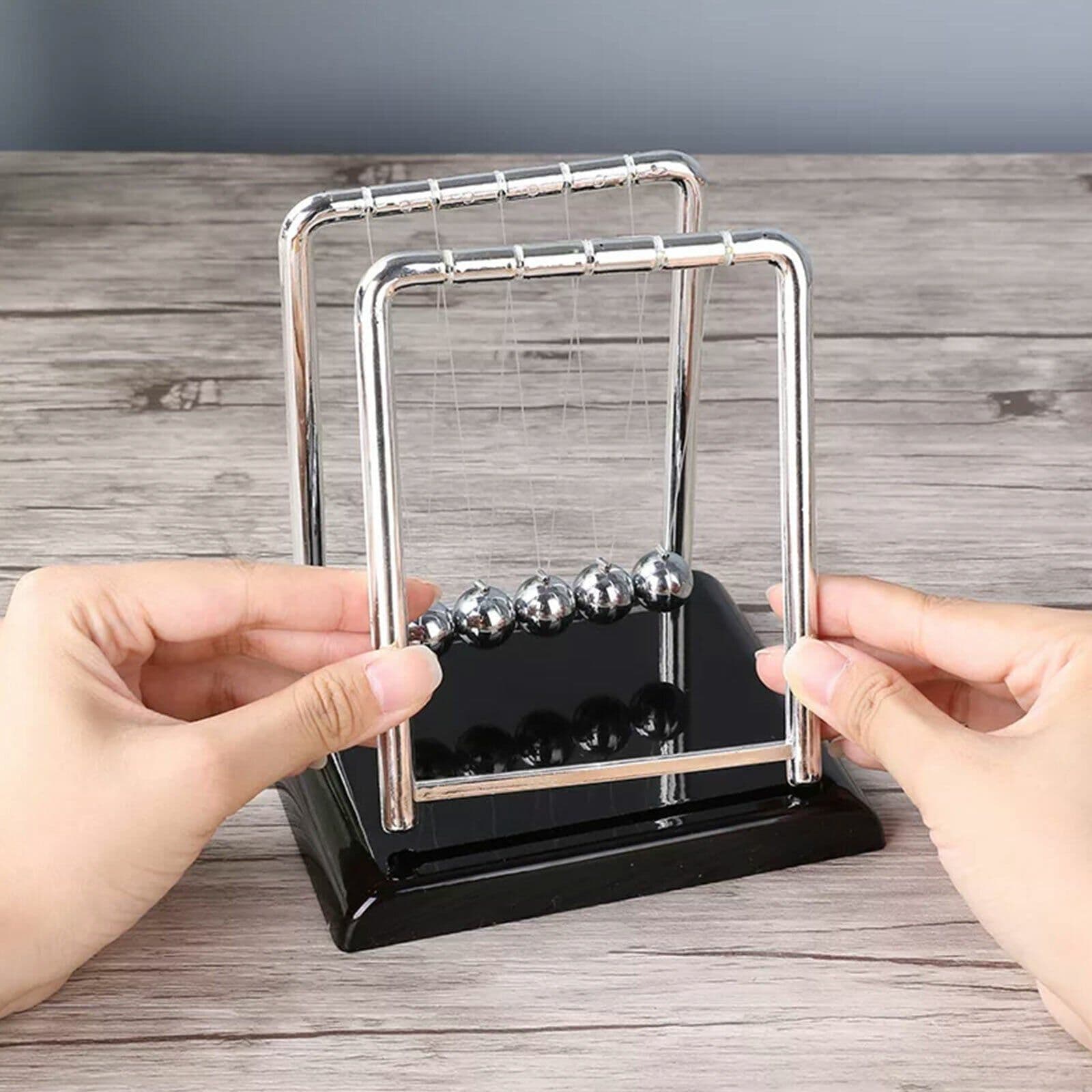 image-Newtons Cradle Steel Balance Ball Physics Science Pendulum Early Development Educational Desktop Toy Gift Office DecorationNewtons Cradle Pendulum Balance Ball Perpetual Motion Physics Decor Gift