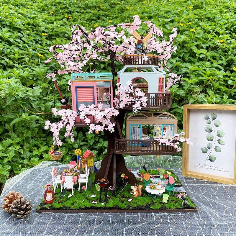 image-Diy Cottage Wood Handmade Pieced Mini House Stereo Puzzle Sakura Forest Treehouse Model Toys