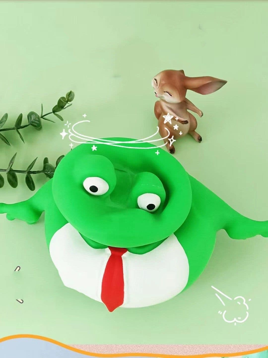image-Decompression Toy Frog Prince Pinching And Pulling
