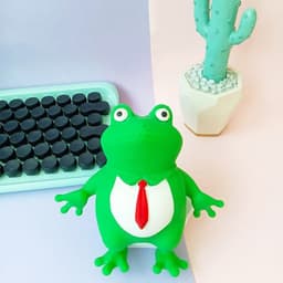 image-Decompression Toy Frog Prince Pinching And Pulling