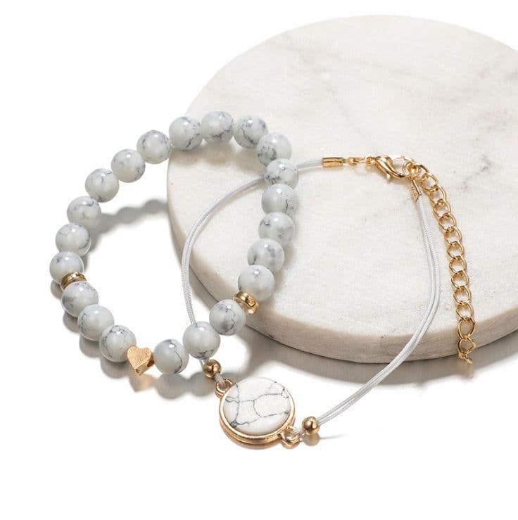 image-Geometric Creative Hollow Fringed Pine Stone Bracelet Four-piece