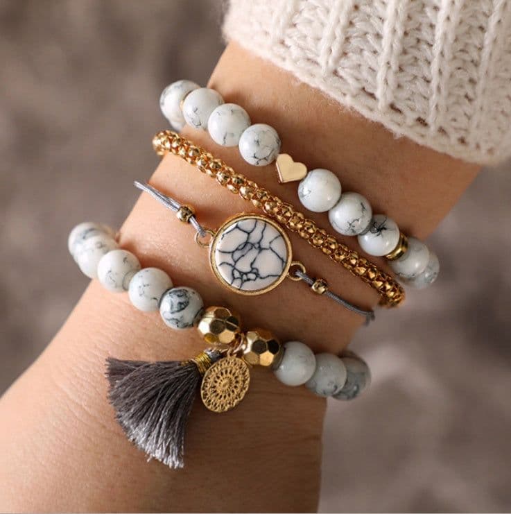 image-Geometric Creative Hollow Fringed Pine Stone Bracelet Four-piece