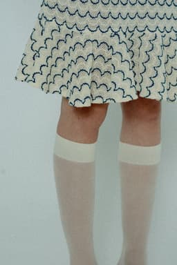 image-Light Weight Cotton Knit High Waist Skirt with Ruffled Hem Marine