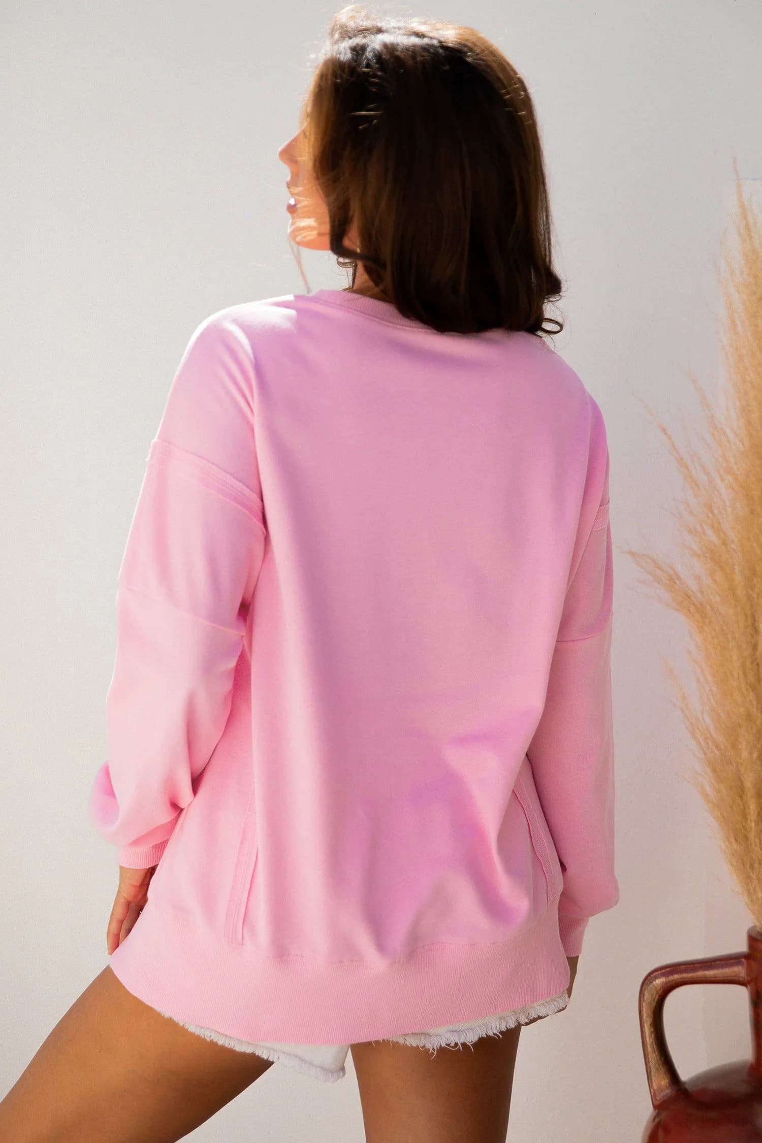 image-Pink Bow Sequin XOXO Letter Graphic Exposed Seam Baggy Sweatshirt