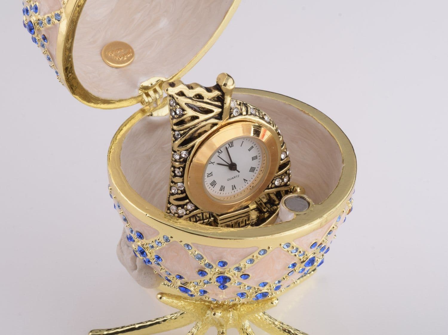 image-Pink Faberge Egg with Clock Inside