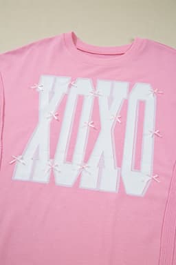image-Pink Bow Sequin XOXO Letter Graphic Exposed Seam Baggy Sweatshirt