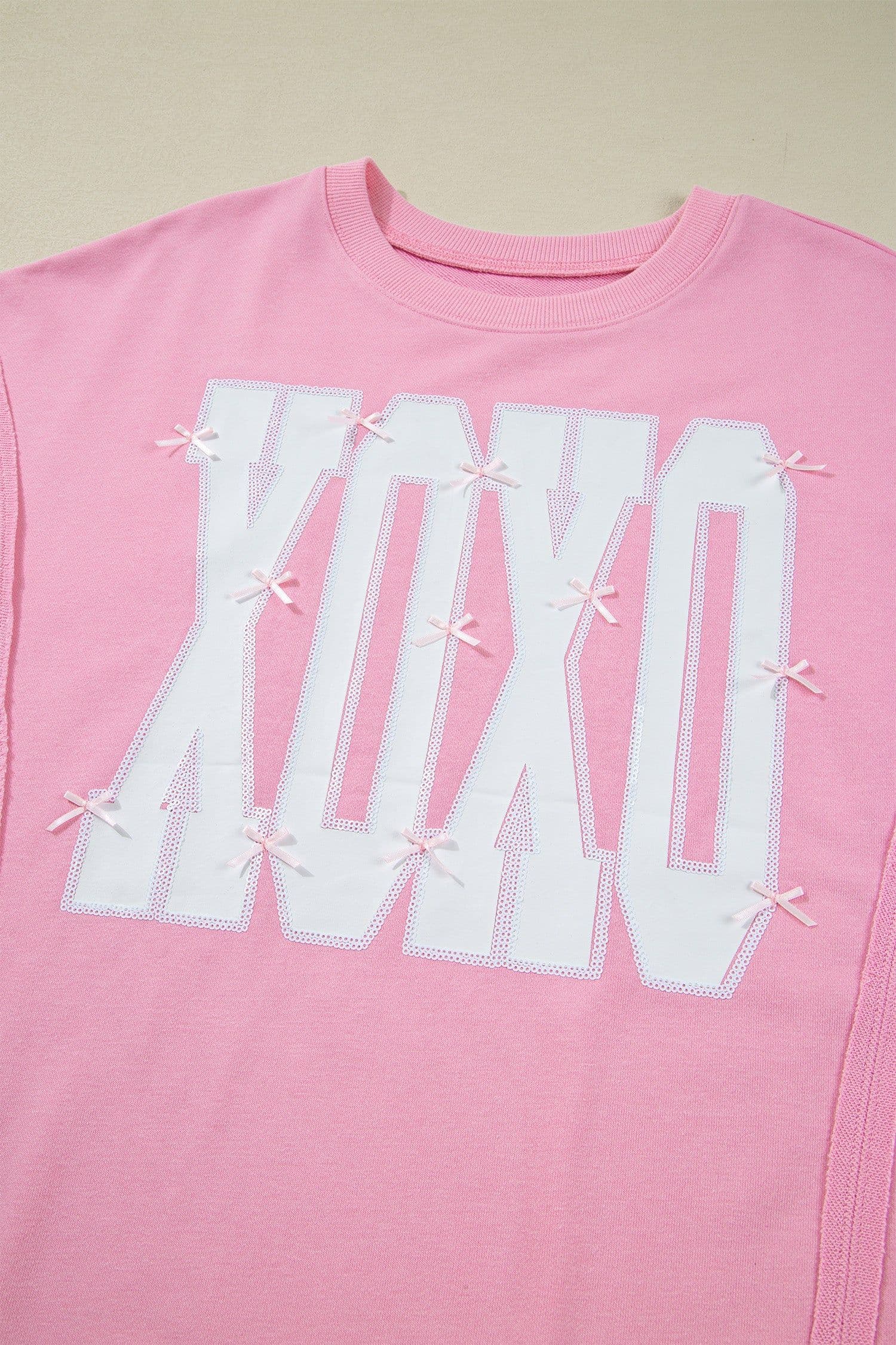 image-Pink Bow Sequin XOXO Letter Graphic Exposed Seam Baggy Sweatshirt