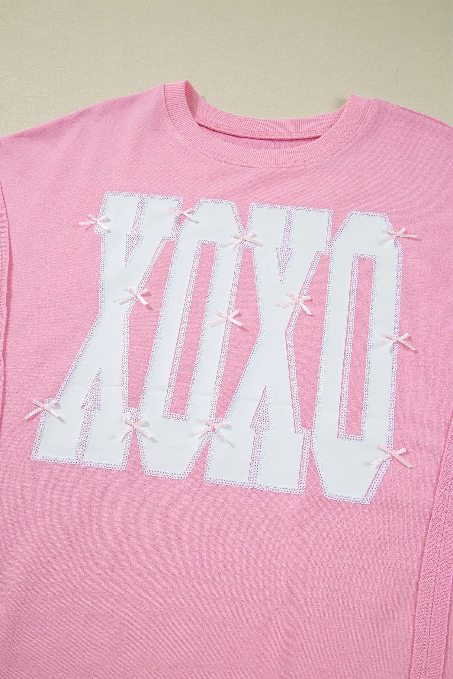 image-Pink Bow Sequin XOXO Letter Graphic Exposed Seam Baggy Sweatshirt