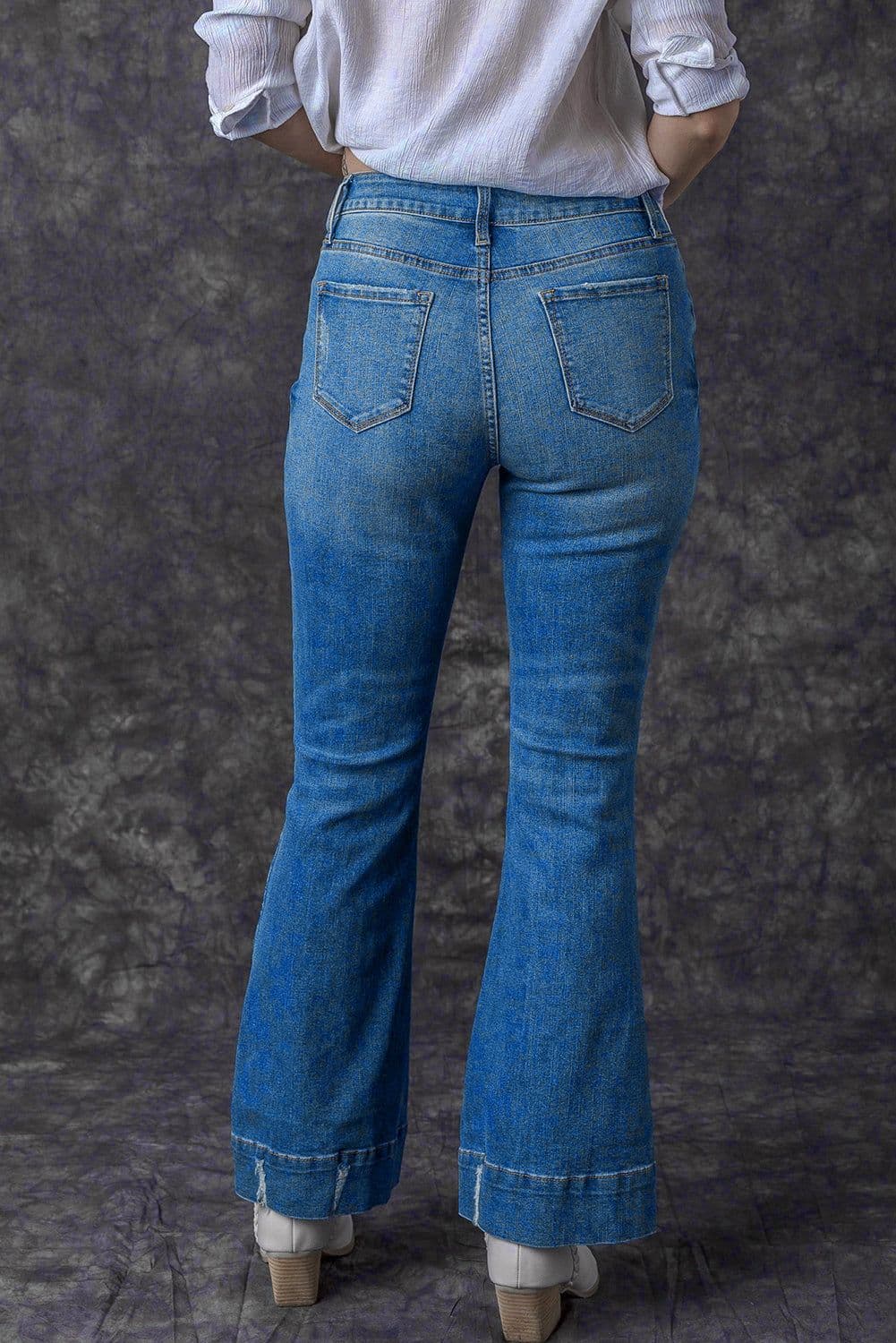 image-Sky Blue Distressed Medium Wash Flare Jeans (65 characters)
