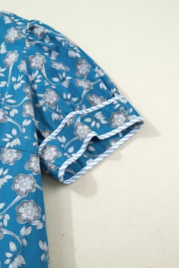 image-Blue Plus Size Floral Print Striped Patchwork Detail Button Front Ruffle Hem Dress
