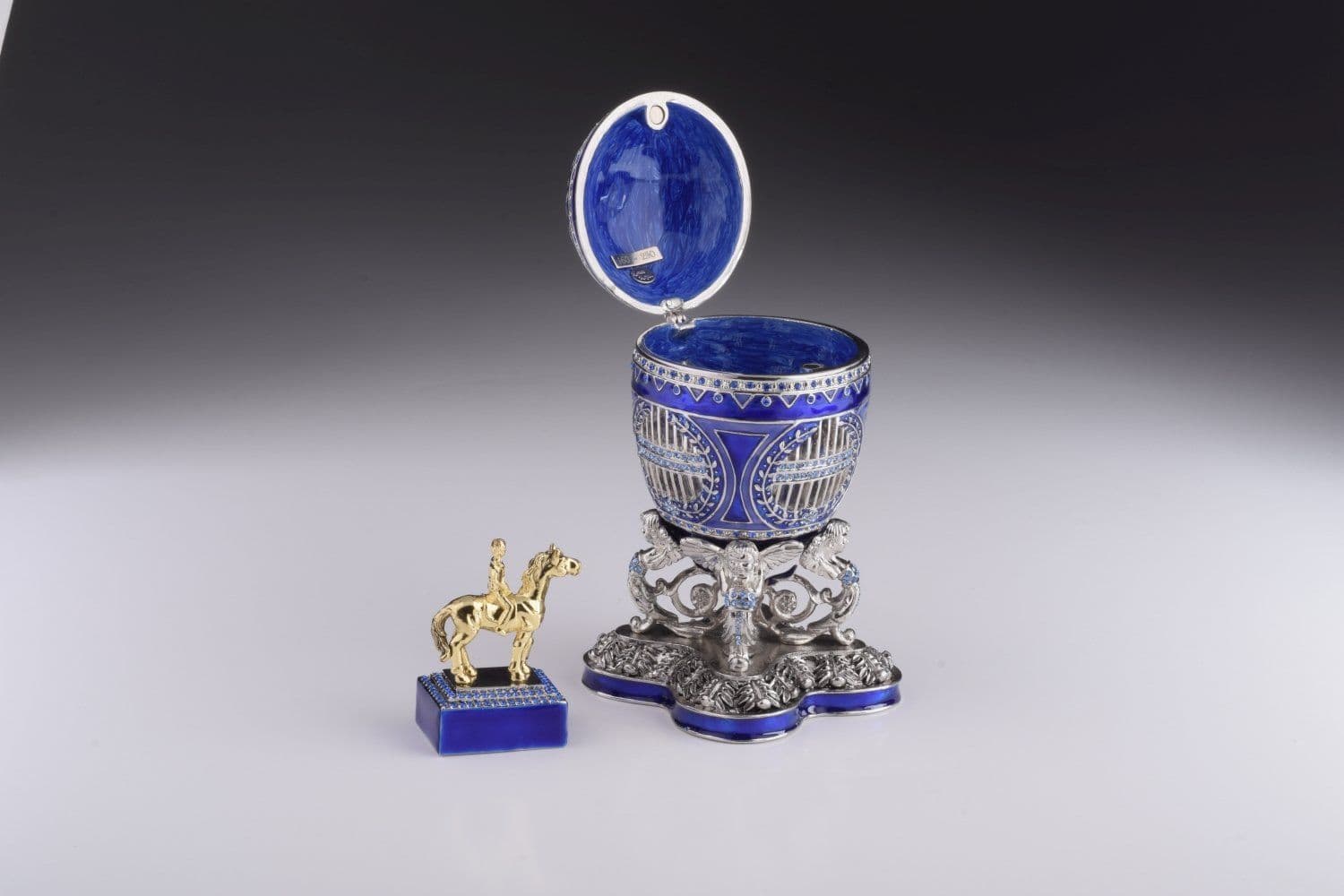 image-Blue Russian Egg with Man Riding Horse Surprise Inside